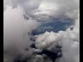Lion Air Boeing 737-400 CGK-PNK fly on cloudy sky