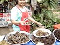 Thai girl eats a cricket in this 3rd...