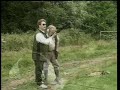 So, Liam Dale has put into practice the things he learnt in our first programme and is now hitting a respectable percentage of the targets he shoots at. He now understands the importance of safety and a lot of the more technical aspects of the sport. It's time to return to the Shalden Shooting School in Devon and to get top coach Rod Brammer to take him onto the next level. Rod will be explaining to Liam how to master some of the more tricky targets; one of which proves to be a real tester for our improving shot. Whilst Liam regroups from a difficult target, we catch sight of his wheelchair-bound friend Andy Beadsley, expertly performing on the driven pheasant stand. To introduce his pupil to a little competitive pressure, Rod suggests that Liam should shoot a 'head to head' with Jacky Coote on the driven grouse stand. Boys against girls... just shows this sport can be enjoyed by everyone. (For those of you who've participated in sporting shooting for a while, you will no doubt recognise the voice of that great character Chris Craddock who adds his expert comment to their performances but who has sadly passed away since this programme was filmed). In preparation for the real thing, we end the programme with Liam putting down his over and under, picking up a side by side and shooting at simulated coveys of driven partridge. For good measure, there's even a demonstration from Rod on how to clean your gun properly when you've finished shooting. This being the second <b>...</b>