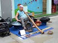 One-man band busking at Oxford