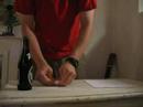 How to open a bottle of beer with a piece of paper