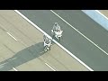 Puppy chase starts at 0:20. A puppy ran loose on the freeway in Phoenix, AZ after its owner got into a car crash. Police had to block off the road and grab the dog before it could be hit by the fast moving traffic all around it. The owner had her two dogs in the car with her when a chain-reaction crash caused her vehicle to flip three times. Only the one dog, a Shih Tzu escaped. Despite how bad the accident looks, both the woman and her dogs were not seriously hurt. They were all reunited at the hospital, and released a short time after the crash.