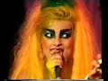 Nina Hagen and Herman Brood were quite notorious for their unforgiving and harsh songs in their respective countries, Germany and Holland. By the time this TV show was recorded (1987) their fame was reputed and they possibly (rumors) had had affairs in the past years. With Nina invited and Herman dropping by, they could not resist to fool the audience, that expected something extreme... Instead, they did this silly 'sweet nothing' duet. Like it or not, this is a document of a young Nina and ...