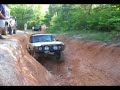 Range Rover Classic playing in a ravine