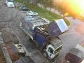 Heil BFI Frontloader emptying 3 containers and compacting Heil BFI Frontloader emptying 3 containers and compacting