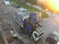 Heil BFI Frontloader emptying 3 containers and compacting
