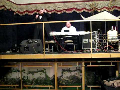 shloime taussig and moshe kestenbaum at wedding in willamsburg