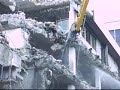 tearing down a building