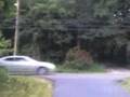 Car runs over full can of soda