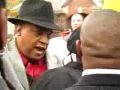 New Black Panther Party tries to protest outside the home of a man who shot and killed burglars. The local residents chase them out of town.