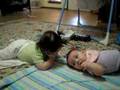 Babies Zoe and Addison doing tummy time