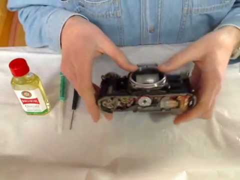 how to open canon ae-1 film door