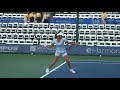 warming up before her match