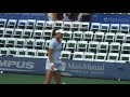 warming up before her match