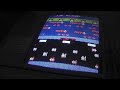 me coining up and playing the first level of the arcade game frogger