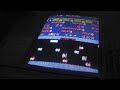 me coining up and playing the first level of the arcade game frogger