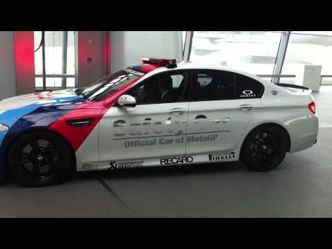Click to play >> BMW F10 M5 Moto GP safety car AKRAPOVIC exhaust BMW Welt doing laps outside of car view