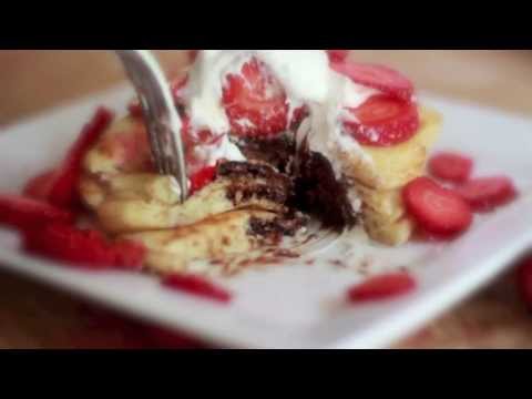 nutella - Get Recipe: http://divascancook.com/2013/05/nutella-stuffed-pancakes-recipe.html Fluffy, buttery homemade pancakes stuffed with creamy Nutella and topped wit...