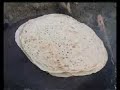 Ghashghai women backing bread and preparing breakfast in Iran.