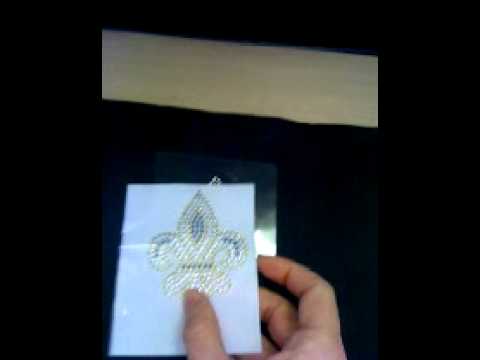 how to remove rhinestone glue from fabric