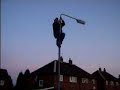 jim climbing a lamppost