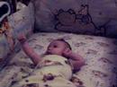 Jayden hanging in the crib. Jayden hanging in the crib.