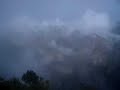 Machu Picchu through the clouds - Sun Gate Machu Picchu through the clouds - Sun Gate