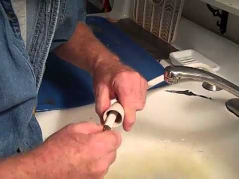 how to remove sink sprayer hose