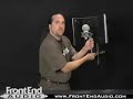 The SE Reflexion Filter is basically a portable device for recording live sound sources with reduced room ambience. It is an advanced composite wall which is positioned behind any microphone by means of a variable position stand clamp assembly which ships with the product. The main function is to help obtain a 'dry' vocal or instrument recording. This is especially useful in studios without proper acoustic treatment, but can also be used to help record takes in control rooms, where the performer also has to operate the recording device, or in rehearsal studios to reduce ambient noise.The SE Reflexion Filter has 6 main layers. Firstly, a strong layer of punched Aluminium which allows sound waves to pass through it, diffused, to a layer of absorptive wool. The sound waves then hit a layer of Aluminium foil which helps dissipate energy and break up the lower frequency wave-forms, and from here they hit an air space kept open by rods passing through the various layers. The air gap acts as an acoustic barrier. The sound waves then pass to a further layer of wool and then through an outer, punched, Aluminium wall which further serve to absorb then diffuse the remaining acoustic energy.The main absorber has 4 formed pieces of state-of-the-art specialist acoustic absorptive material attached to its face via the extended separation rods, which further serve to absorb and then diffuse the sound waves as they pass to the main filter.The stand assembly comprises a mic stand clamp fitting, which attaches by means of a vertical joint to the horizontal bar assembly onto which both the Reflexion Filter, and any standard fitting shock mount can be fixed. The microphone (in its shock mount) can then be moved both vertically and horizontally along the bar, and the Reflexion Filter itself can be moved vertically to obtain the optimum working position.