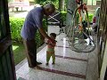 MOV01006.AVI Abhinav with water tube washes his house verandah