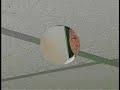 Steel balls stick to ceiling with induced magnetism