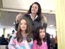 sophie and nicole with wonder woman at the airport, she is so nice