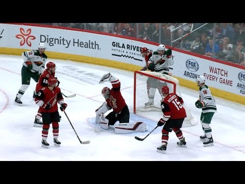Darcy Kuemper raises the glove for fantastic save on Hunt