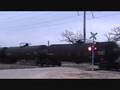 CN Freight at Rural Highway Grade Railroad Crossing