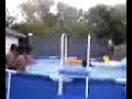 Guys doing tricks in the pool