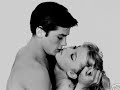 premiere magazine posted a list of the 100 sexiest movie stars of all time, from that list delon was placed at number 72.


1. marilyn monroe
2. marlon brando
3. brigitte bardot
4. rudolph valentino
5. angelina jolie 
6. james dean 
7. sean connery
8. raquel welch
9. brad pitt 
10. halle berry
11. george clooney 
12. steve mcqueen
13. clark gable 
14. rita hayworth
15. ava gardner 
16. paul newman
17. rock hudson
18. denzel washington
19. sophia loren 
20. kevin costner 
21. jack nicholson
22. ursula andress
23. viggo mortensen
24. michelle pfeiffer 
25. robert redford
26. kim basinger 
27. elizabeth taylor
28. salma hayek
29. jean harlow
30. warren beatty
31. greta garbo 
32. clive owen
33. russell crowe
34. jane russell 
35. ann-margret 
36. catherine zeta-jones 
37. sharon stone 
38. veronica lake 
39. jane fonda 
40. gary cooper 
41. eric bana
42. catherine deneuve 
43. lena olin 
44. jayne mansfield
45. lana turner 
46. jean-paul belmondo 
47. dorothy dandridge 
48. monica bellucci 
49. antonio banderas 
50. harrison ford
51. jennifer connelly 
52. gong li
53. anita ekberg
54. gina lollobrigida 
55. uma thurman 
56. charlize theron
57. britt ekland 
58. cameron diaz
59. dennis quaid
60. elvis presley 
61. colin farrell
62. kim novak
63. will smith
64. daniel day-lewis
65. pierce brosnan
66. diane lane
67. scarlett johansson
68. robert mitchum
69. johnny depp
70. natalie wood 
71. gene tierney
72. alain delon 
73. penelope cruz
74. tom cruise 
75. keanu reeves 
76. errol flynn 
77. claudia cardinale 
78. richard gere 
79. lauren bacall 
80. demi moore
81. mae west
82. richard burton
83. bo derek  
84. jude law
85. jennifer lopez
86. christian bale
87. mel gibson 
88. pam grier 
89. daniel craig
90. aishwarya rai
91. jeff bridges
92. hugh jackman 
93. hedy lamarr 
94. burt reynolds 
95. louise brooks 
96. marlene dietrich 
97. dorothy lamour 
98. susan sarandon 
99. omar sharif 
100. gael garc�a bernal

music: