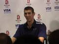 Michael Phelps talks with Brad Blanks at Beijing Olympics