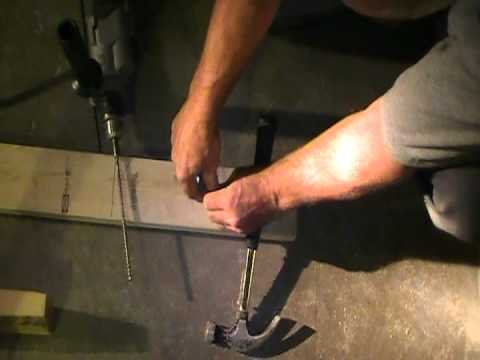 how to fasten wall to concrete floor