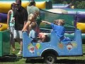 All aboard the Trackless Train!  That's right a train with no tracks and no electricity.  That means our train can travel anywhere on just about any flat surface: grass, asphalt, gravel and pavement. Our colorful engine and cars bring excitement to any event.  This train carries both children and adults.  A Trackless Train is a wonderful addition to kids birthday parties, festivals and company picnics.  There are 4 train cars so that 16 adults or up to 24 young children can ride at once.  If your budget is smaller, we can reduce the amount of train cars at your event.  Each train car has its own characters painted on them for the kids to choose from.  Our train has a working whistle and bellIf you plan to have the Trackless Train at your event, you must plan on it being the biggest attraction for young kids.  Map out a path that you would like the train to take.  Make sure the path is not where people will want to walk across.  A child must be 30 inches or taller to ride the train without an adult with them.  72 inches is the maximum height allowed on the train.  The maximum weight per train car is 600 pounds.  There should be no more than 3 children or 2 adults per seat.www.thefunones.com630-495-3200