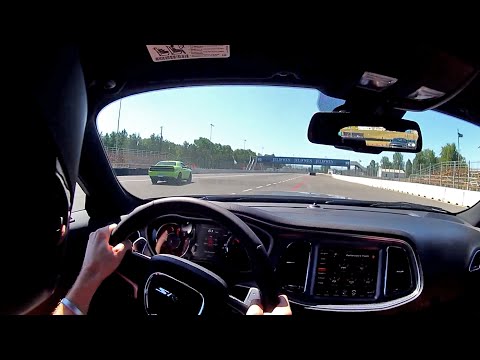 POV - Winding Road Senior Editor Bradley Iger goes out for an instructed fast lap on the Portland International Raceway road course in the 707 horsepower 2015 Dodge Challenger SRT Hellcat, here equipped...