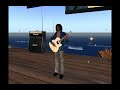 Strummer Vultee perfoms That Aint Rain in Secondlife Strummer Vultee perfoms That Aint Rain in Secondlife