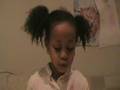 Nia reading in Spanish and English age 6