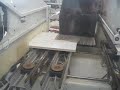 C.N.C. WORKING CENTER (POINT TO POINT)- SEMI-NEW machine, CE mark, with 2 side (lateral) safety metal walls - Complete safety enclosure on the working head (Soft Impact Bumpers)- Goose-neck type machine - Numerical Control ESA Tria and software ASPAN-XILOG- 1st Automatic Tool Changing System on the working head (No. 4 storage places for tools)- 2nd Automatic Tool Changing System on the machine's side (No. 7 storage places for tools)- Max X axe stroke for vertical electro-spindle (router) mm 3300, with extra stop at mm 3780- Max Y axe stroke for vertical electro-spindle (router) mm 1340- Max Y axe stroke for vertical drilling bits mm 1120- Max Z axe stroke mm 200 (max workpieces/panel passage mm 180)- Lenght of the working supports mm 1200- With No. 1 Vacuum Pump (100 m3/h capacity)- With No. 14 independent vertical boring spindles (for X and Y axes)- With No. 6 independent horizontal boring spindles (for X and Y axes)- No. 1 Vertical electro-spindle (router) power HP 9, with access to the Tool change System- No. 1 Horizontal electro-spindle with double exits (tools), rotating 0°-180° by C.N.- No. 1 Circular saw Unit, rotating 0°-90° by C.N., max diam. mm 200- Total installed power KW