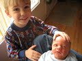 casimir takes a short video (with the help of dad) of his new baby brother, daniel.