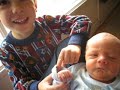 casimir takes a short video (with the help of dad) of his new baby brother, daniel.