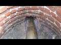 Pipebursting head entering a manhole - Ted Berry Co