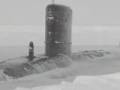 Nuclear Submarine breaking through the Ice