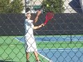 tennis jump serve and two-handled racket