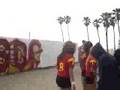 USC 7 cheerleaders in front of mural Venice beach california