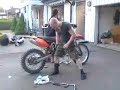Me hand cranking my KTM 450 with HD carb!